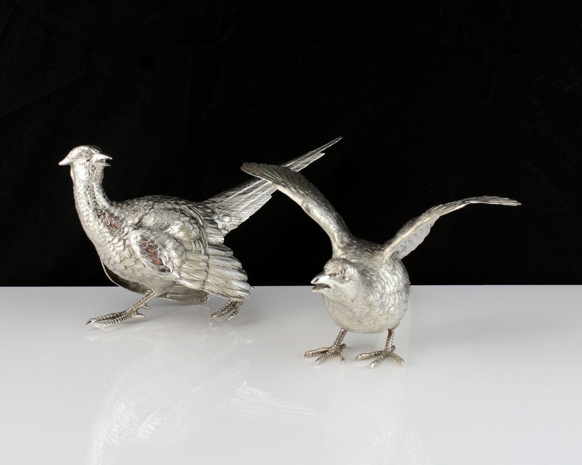 A pair of antique German Silver pheasant statues by Neresheimer of Hanau circa 1890 realistically