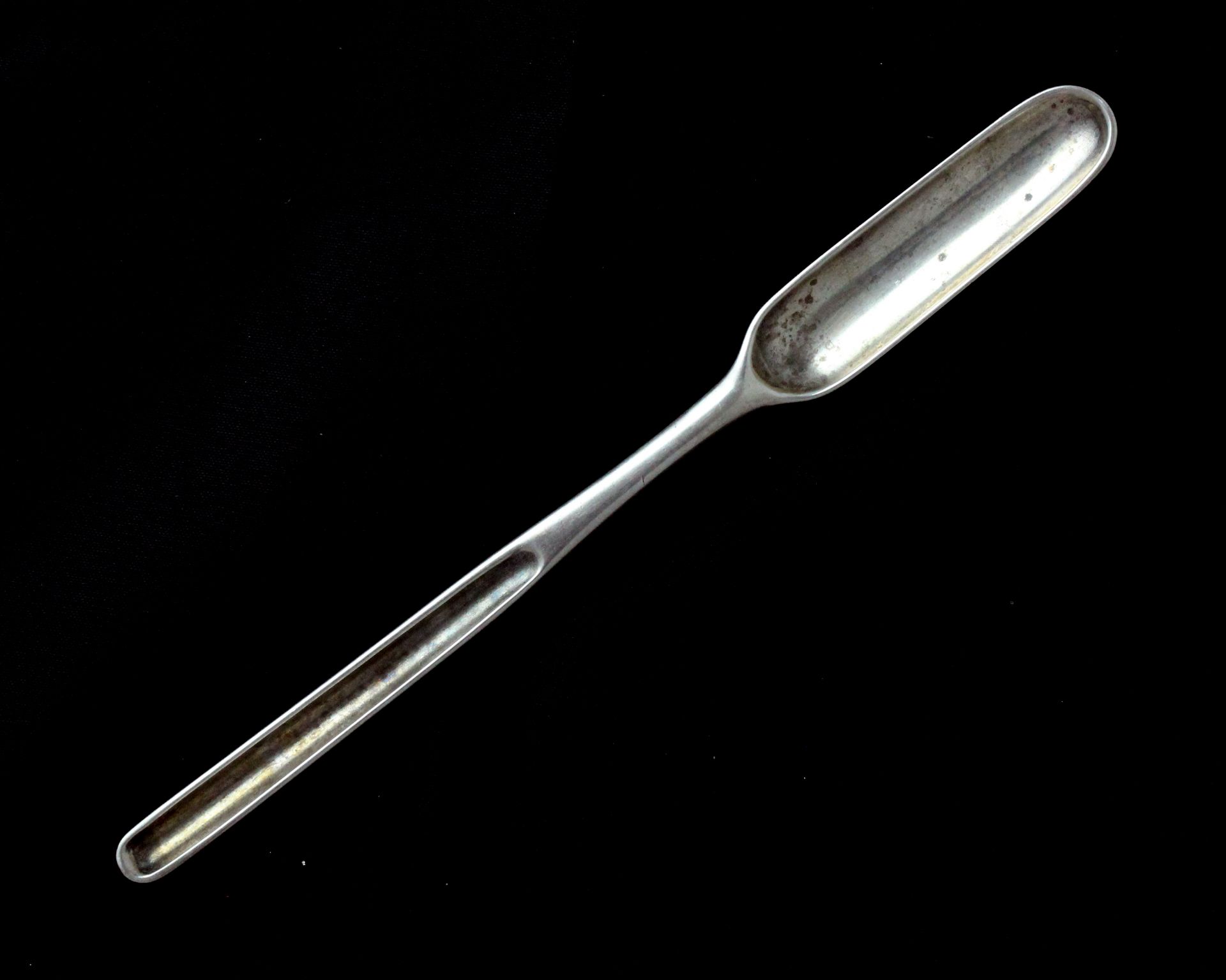 An antique George II Sterling Silver marrow scoop by Thomas Whipham, London 1753 with engraved crest