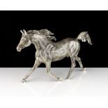 A Sterling Silver statue of a horse by Edward Barnard, London 1974 designed to depict a horse