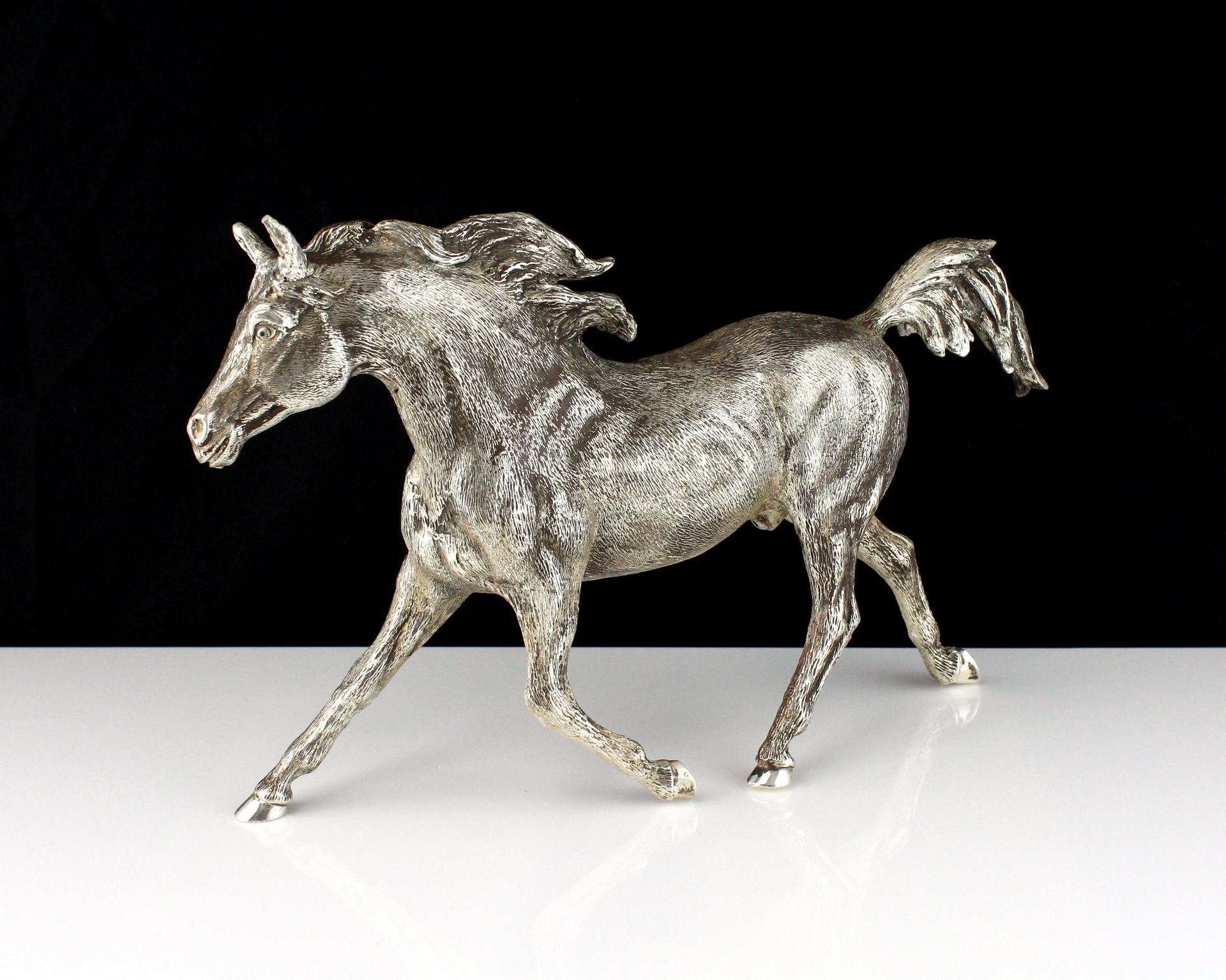A Sterling Silver statue of a horse by Edward Barnard, London 1974 designed to depict a horse