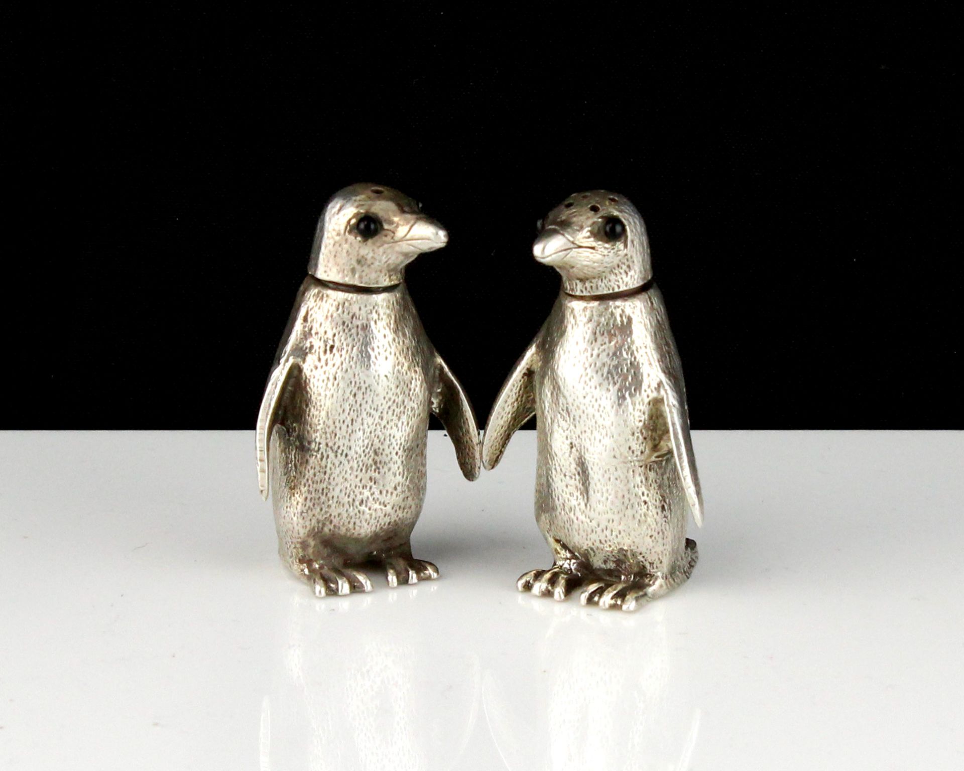 An pair of vintage novelty Sterling Silver penguin salt & pepper pots by William Comyns & Sons