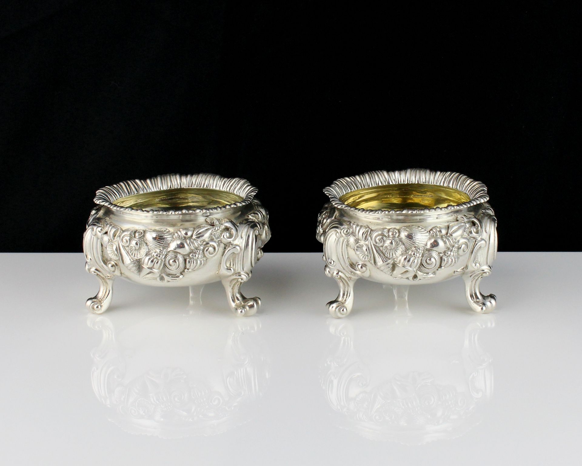 A pair of antique George III Sterling Silver salt cellars by John Harris IV, London 1818 each of