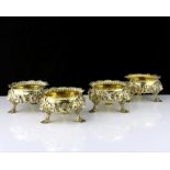A set of four antique George II Sterling Silver gilt salt cellars by Peter White, London 1746 of