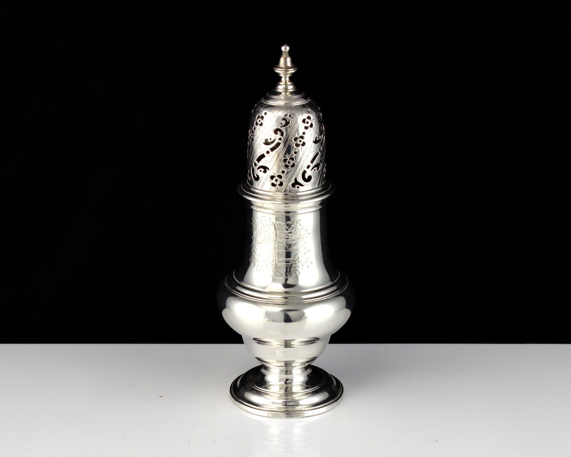 An antique George II Sterling Silver sugar castor / muffineer by John Delmster, London 1753 of