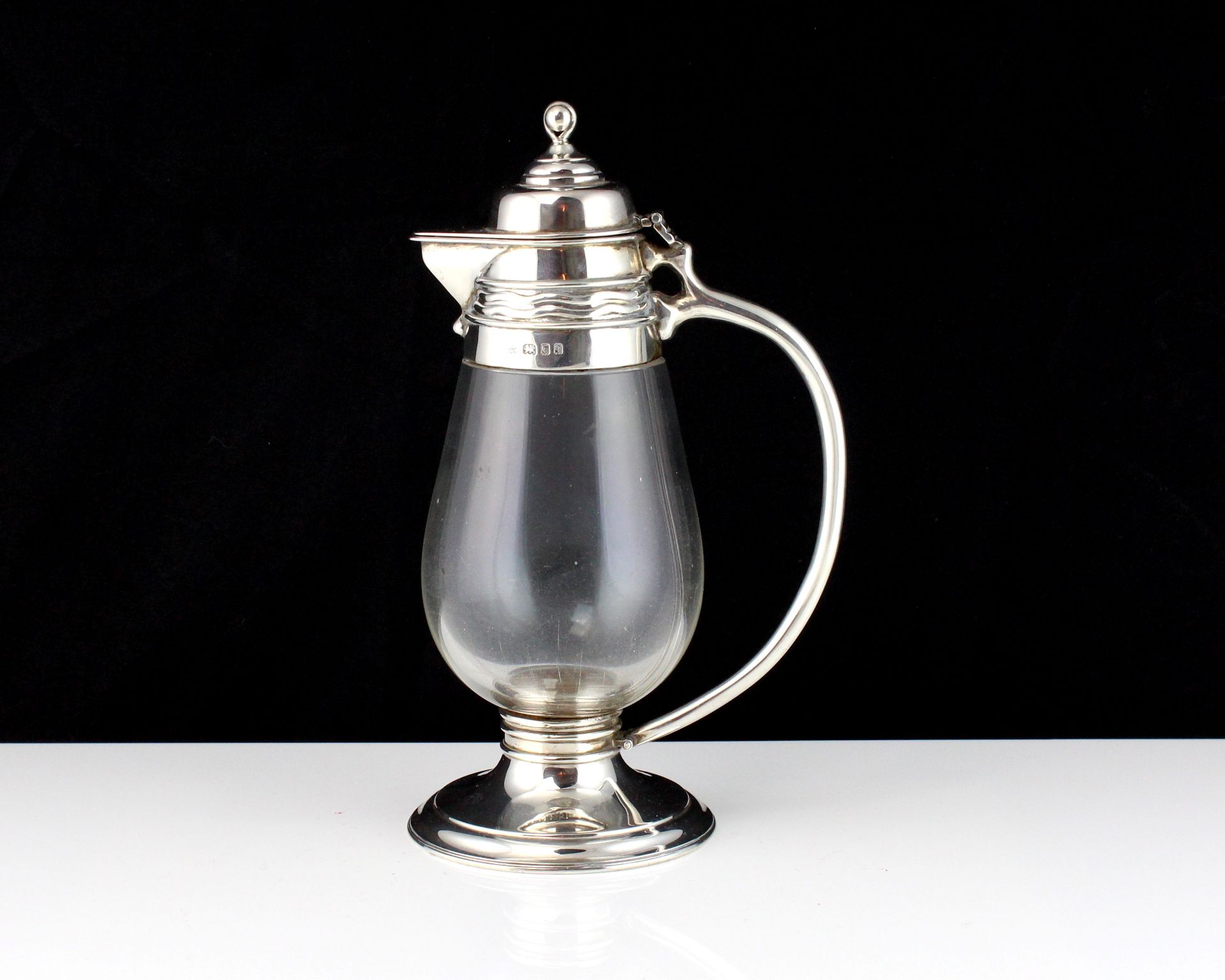 An antique George V Sterling Silver mounted miniature flagon / jug by A R Mowbray & Co Ltd, London