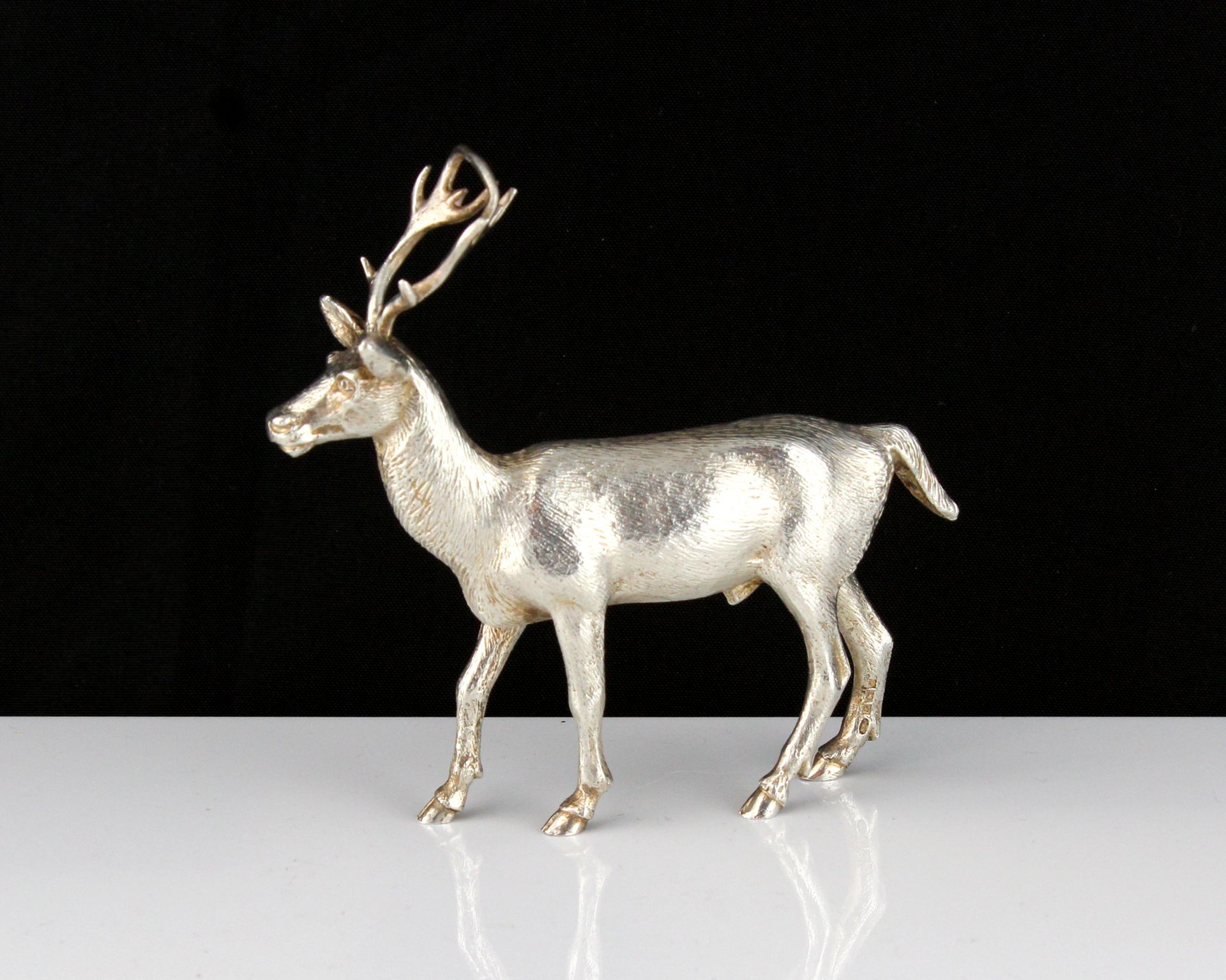 A vintage Sterling Silver statue of a stag by A E Jones, Birmingham 1973 designed to depict a stag