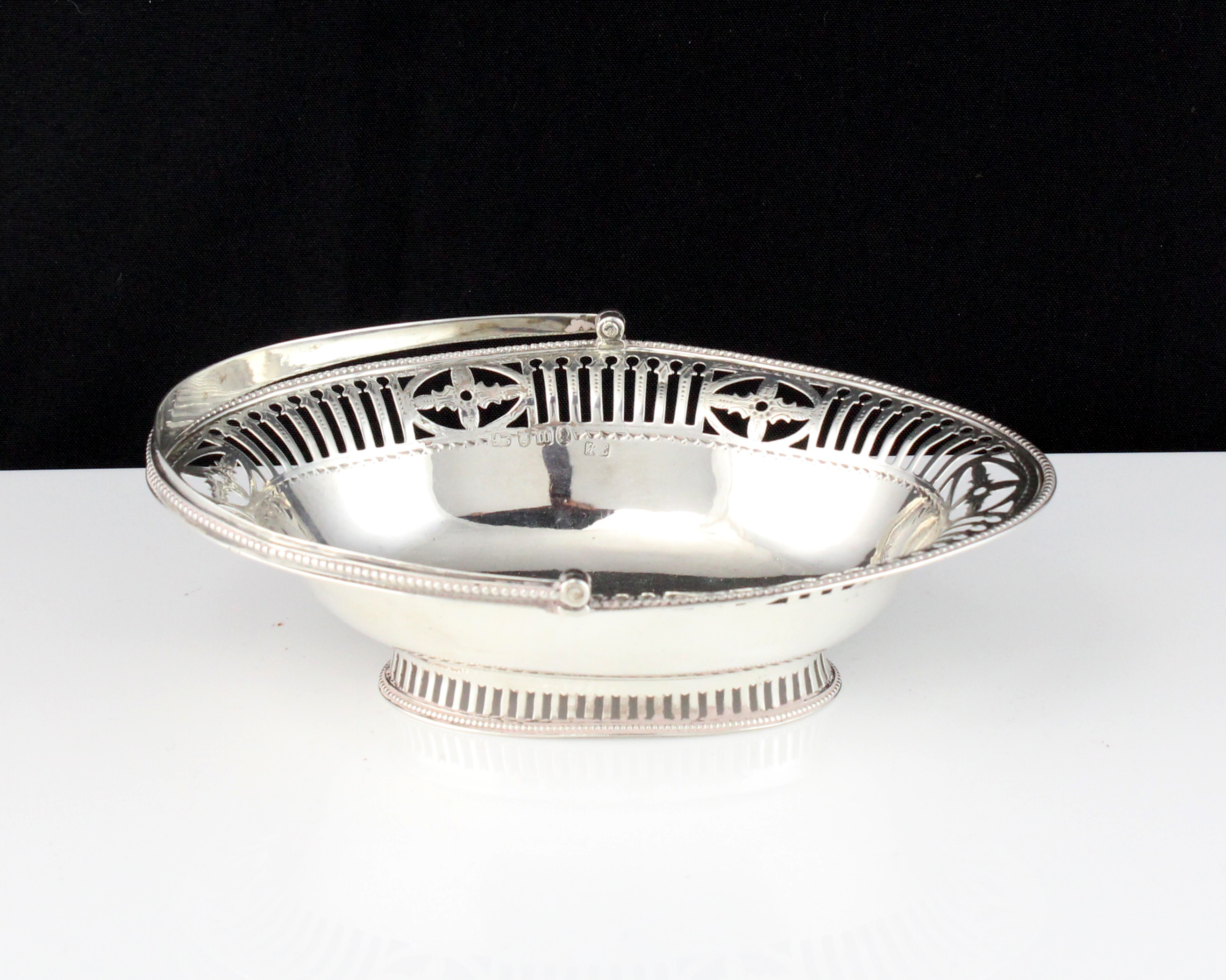 An antique George III Sterling Silver basket by Hester Bateman, London 1787 of navette form with