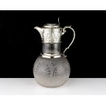 An antique Victorian Sterling Silver mounted claret jug by William & George Sissons, Sheffield