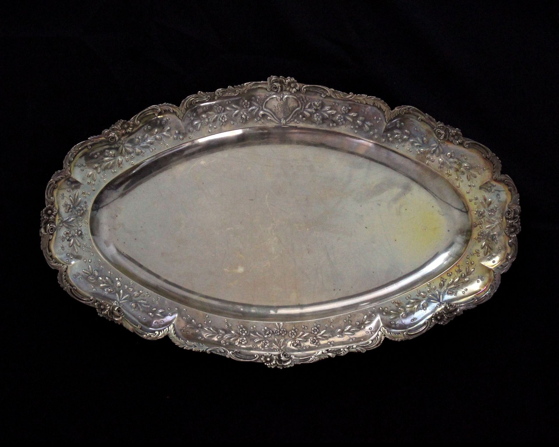 An antique French Silver meat tray / serving platter circa 1890 of elongated oval form with raised