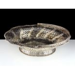 An antique George III Sterling Silver cake / bread basket by Edward Aldridge II, London 1763 of