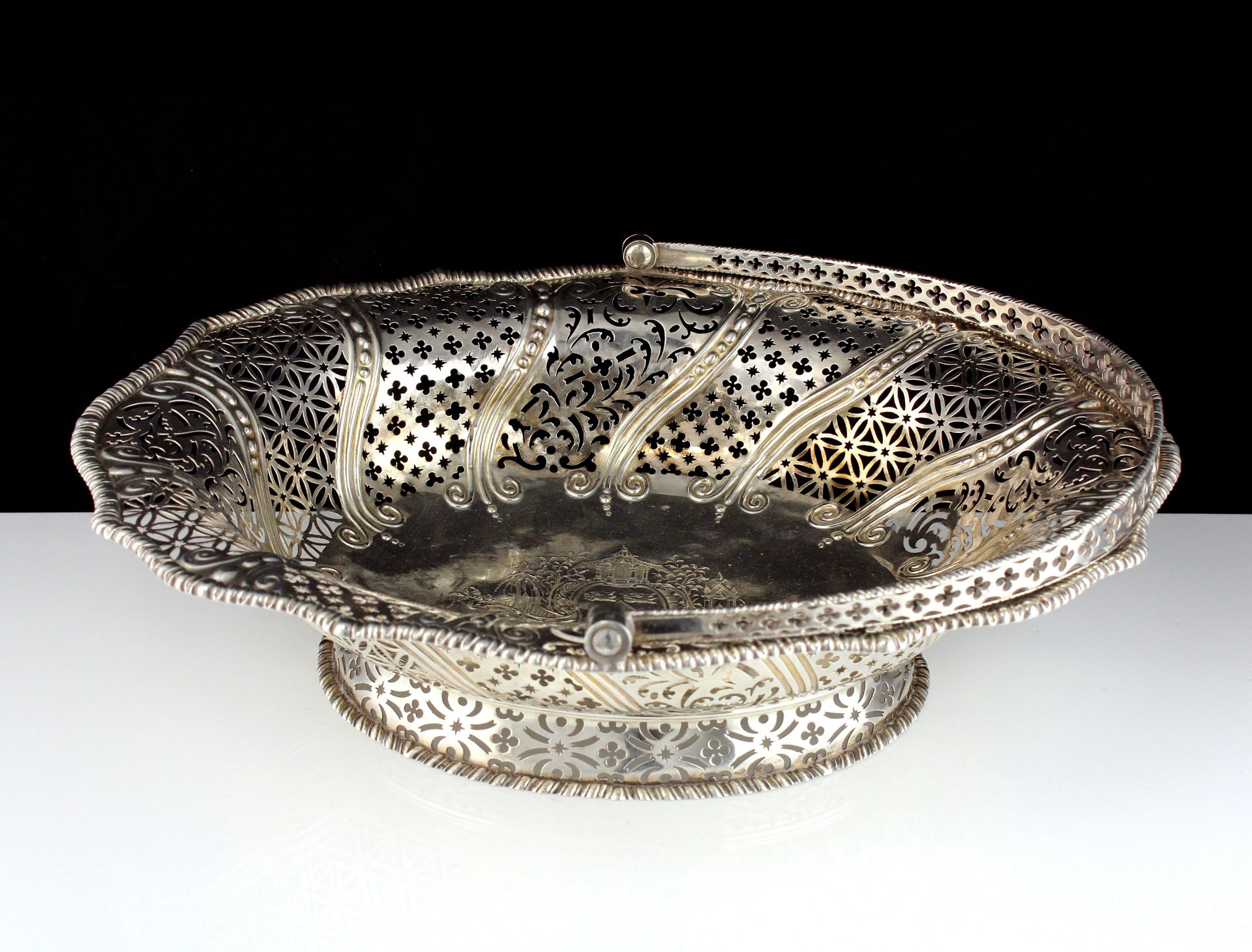 An antique George III Sterling Silver cake / bread basket by Edward Aldridge II, London 1763 of