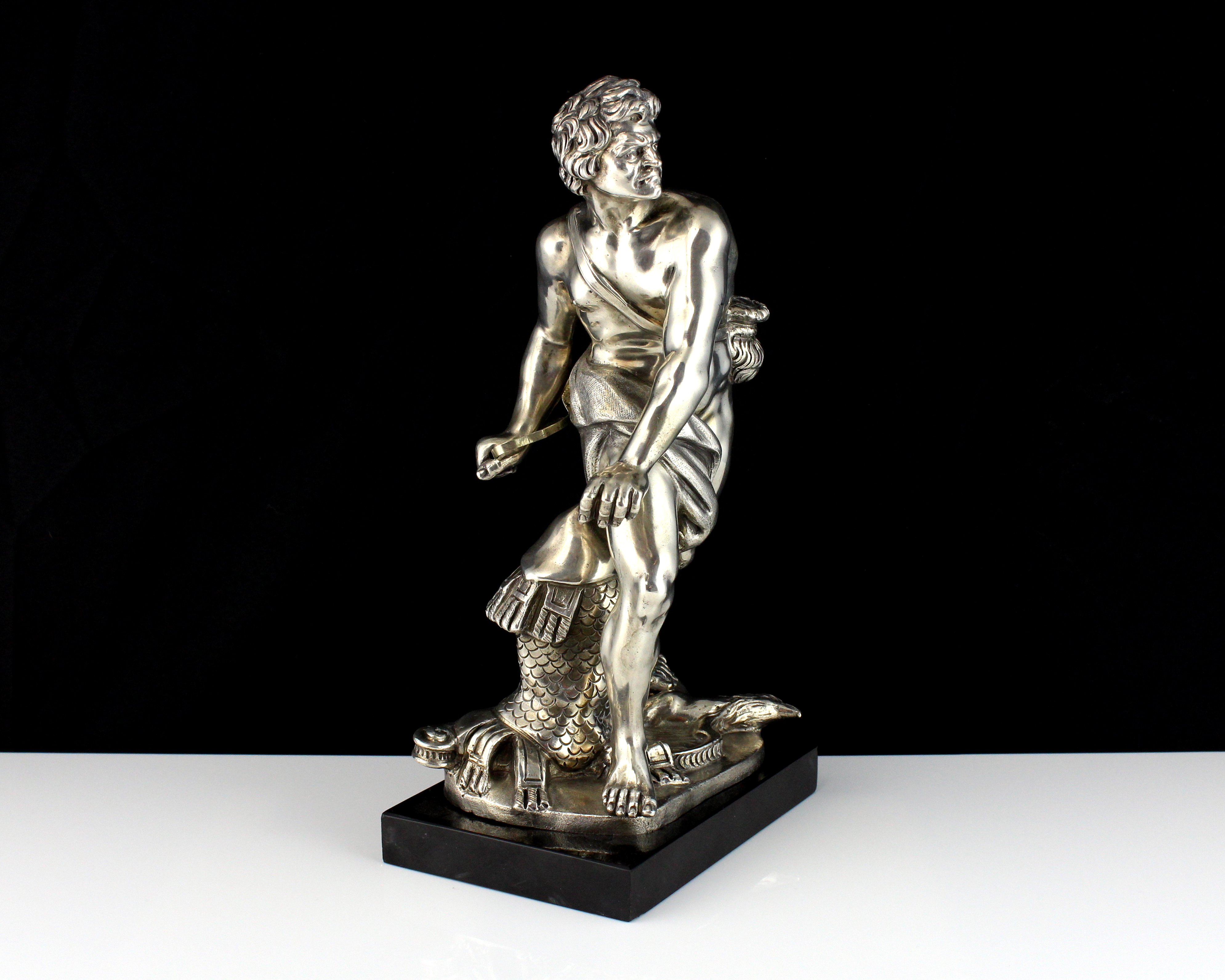 An Italian Silver sculpture after David by Gian Lorenzo Bernini depicting David with slingshot about