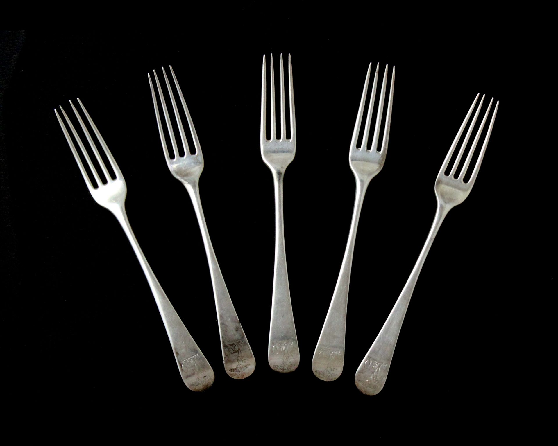 A set of five antique George III Sterling Silver dinner forks maker's mark indistinct, London 1773