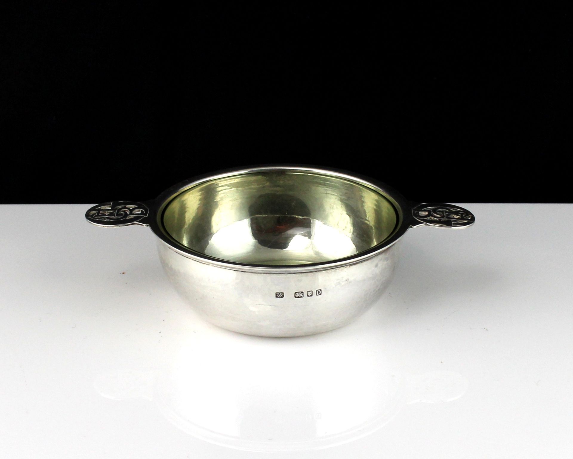 An antique Arts & Crafts Sterling Silver quaich by William Henry Warmington, London 1939 of