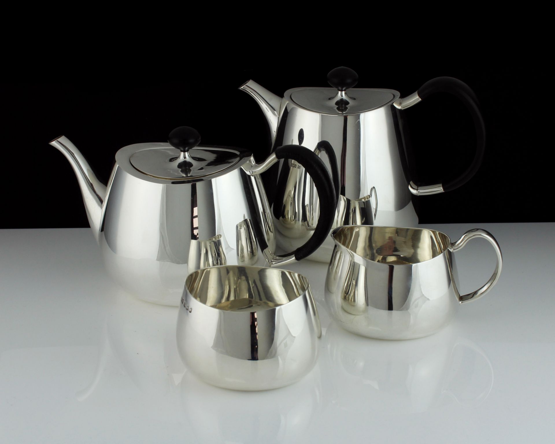 A vintage Sterling Silver 'Pride' four piece tea and coffee set designed by David Mellor and made by