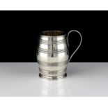 An antique George III Sterling Silver barrel mug by John Robins, London 1783 designed in the form of