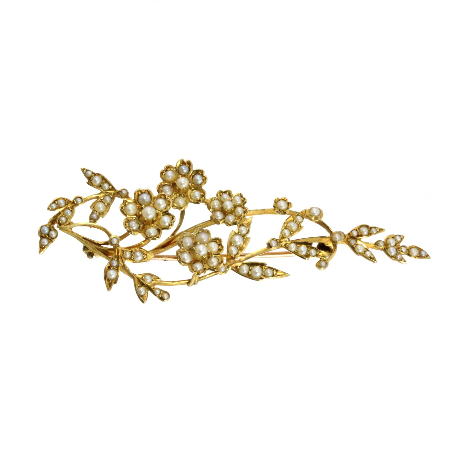 AN ANTIQUE PEARL BROOCH, LATE 19TH CENTURY designed as a floral spray with leaves and flowers,