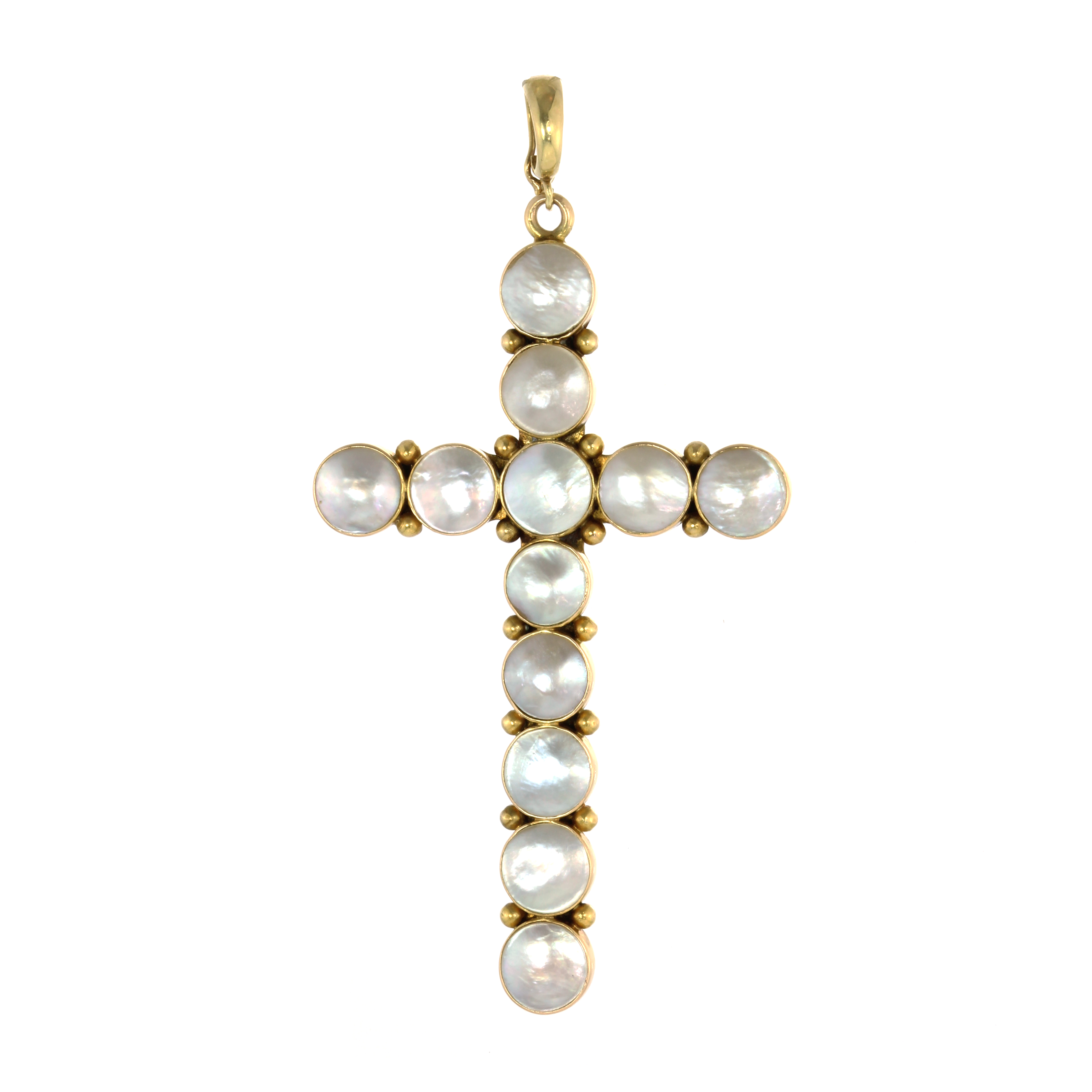 A MOTHER OF PEARL CRUCIFIX / CROSS PENDANT designed as a traditional cross made of up twelve