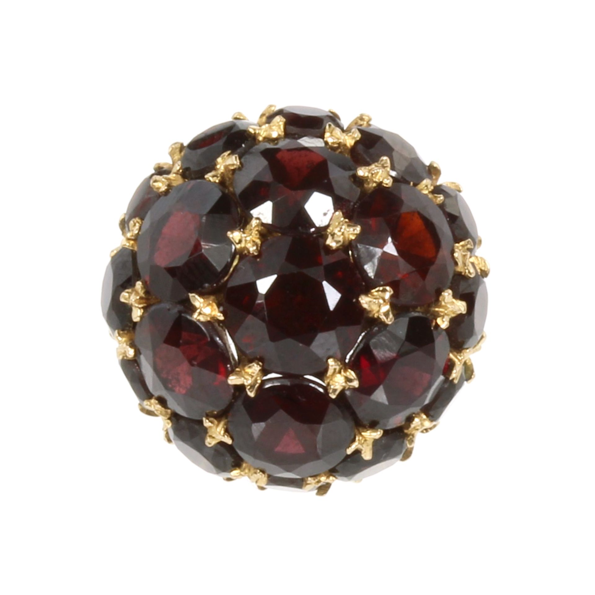 A GARNET BOMBE DRESS RING designed as a blackberry, set with nineteen variously sized round cut