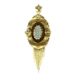 A PEARL AND ENAMEL MOURNING LOCKET, 19TH CENTURY the oval body in the Etruscan revival style, with