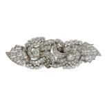 A DIAMOND DOUBLE CLIP BROOCH designed as two brooches each with a central round brilliant cut