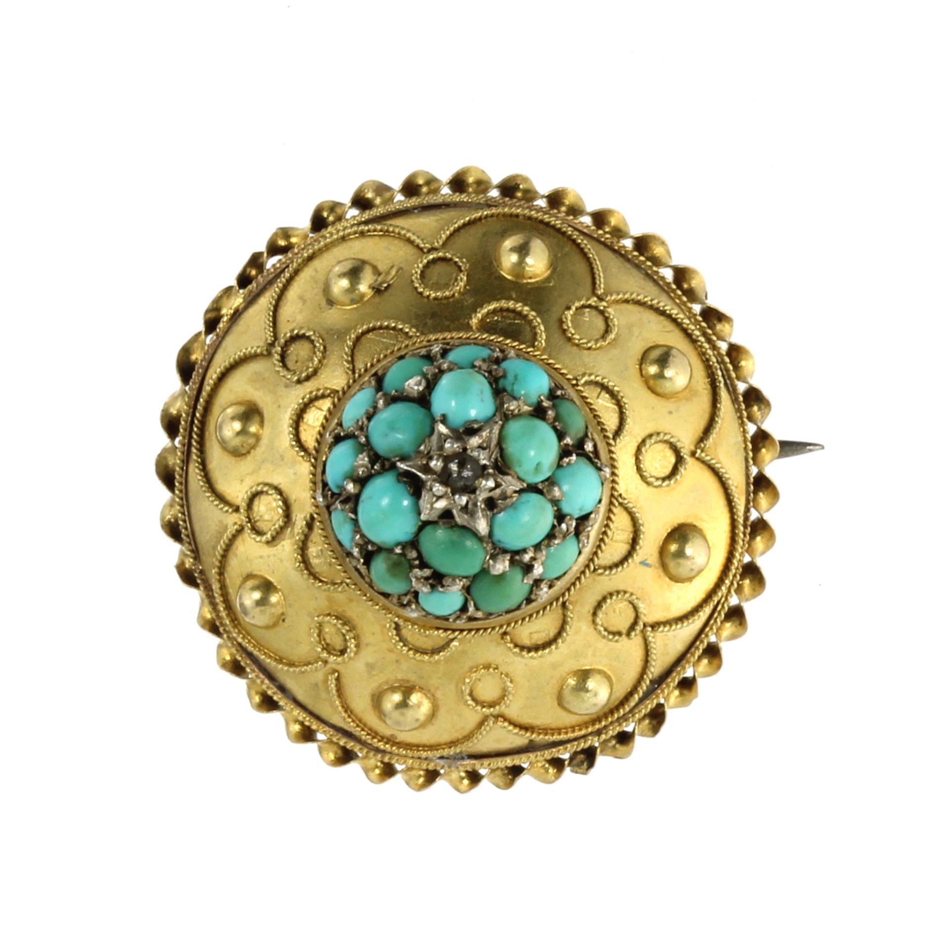 AN ANTIQUE TURQUOISE AND DIAMOND MOURNING BROOCH of circular form, set with a central berry motif