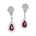 A PAIR OF RUBELLITE TOURMALINE AND DIAMOND EARRINGS each set with a pear cut rubellite of 2.75 and