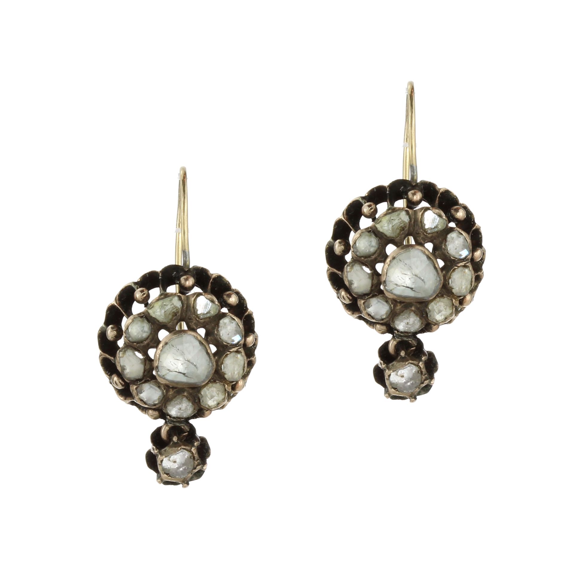 A PAIR OF DIAMOND EARRINGS, 19TH CENTURY each set with a central rose cut diamond encircled by a row