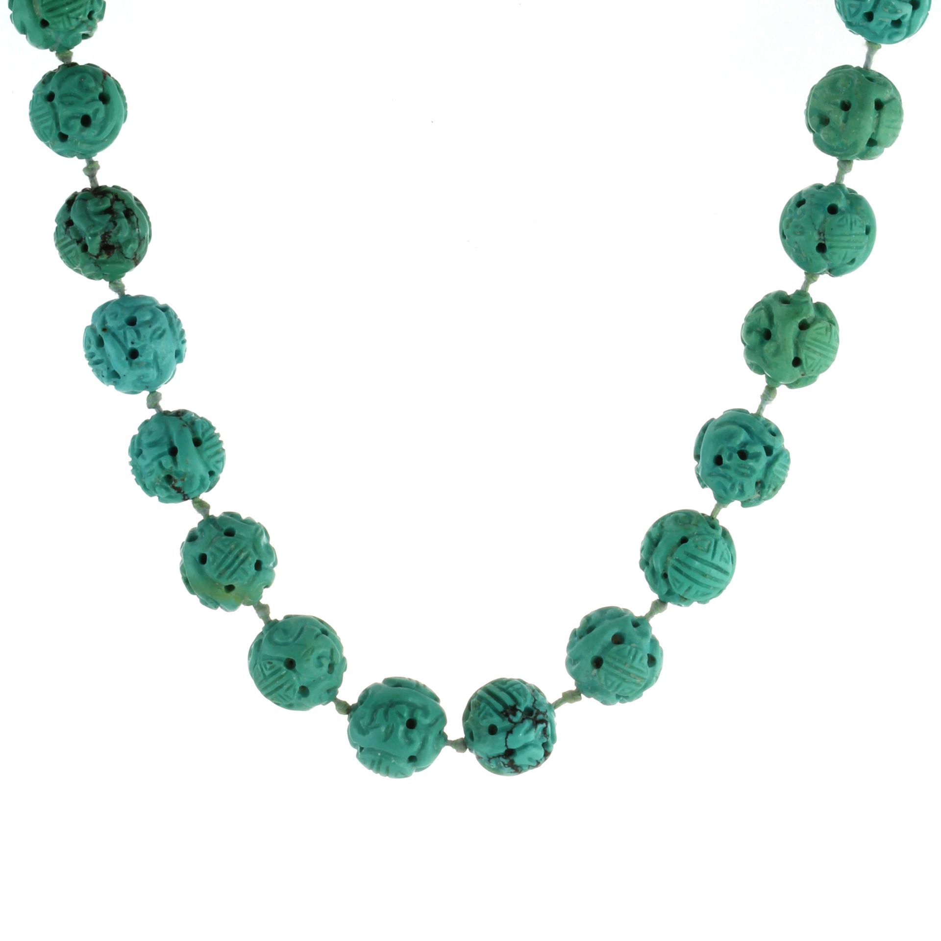 AN CHINESE CARVED TURQUOISE BEAD NECKLACE comprising a single row of thirty one carved turquoise