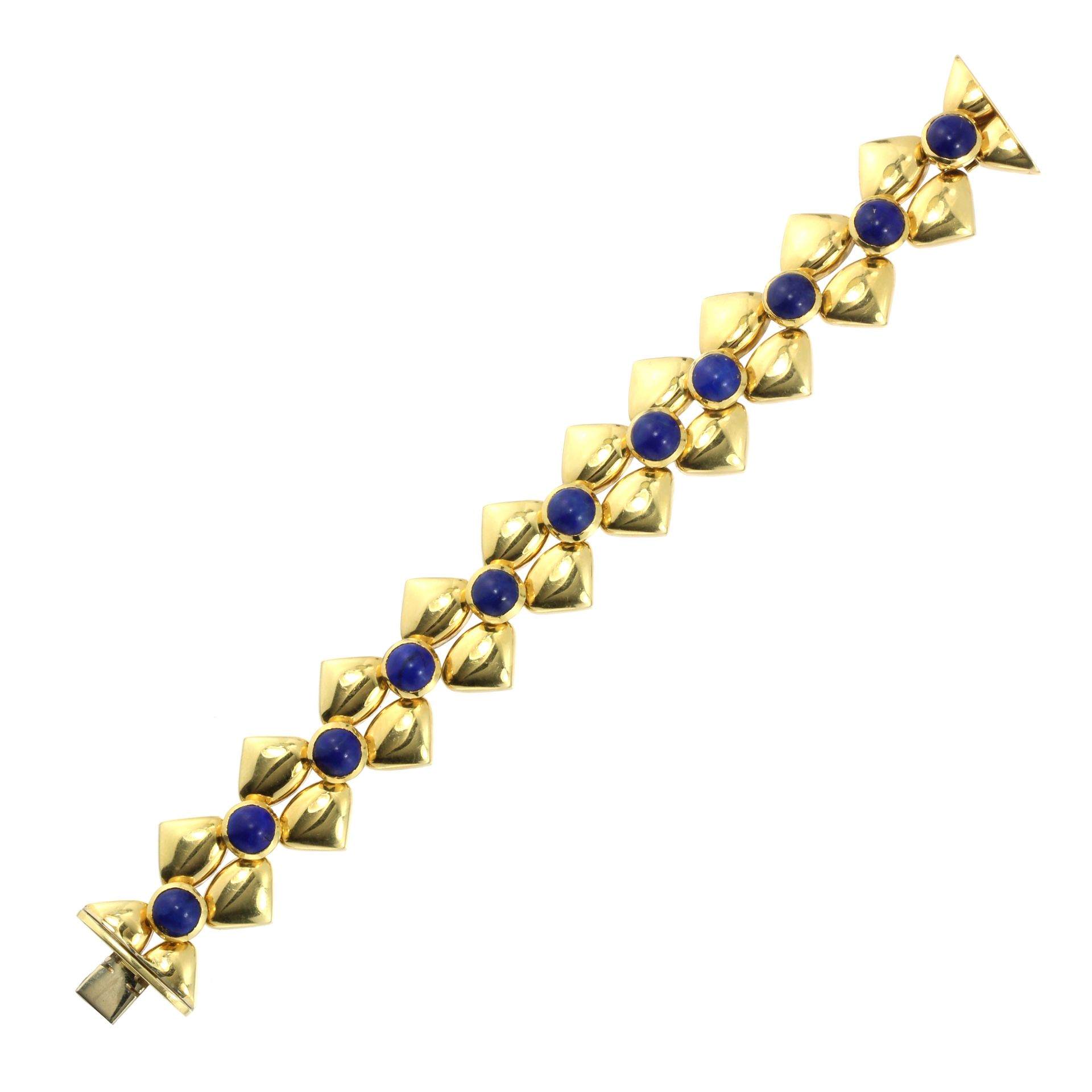 A LAPIS LAZULI BRACELET, CIRCA 1975 set with a single row of eleven circular lapis lazuli