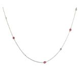 A RUBY AND DIAMOND LONGCHAIN NECKLACE set with alternating round cut rubies and diamonds, length