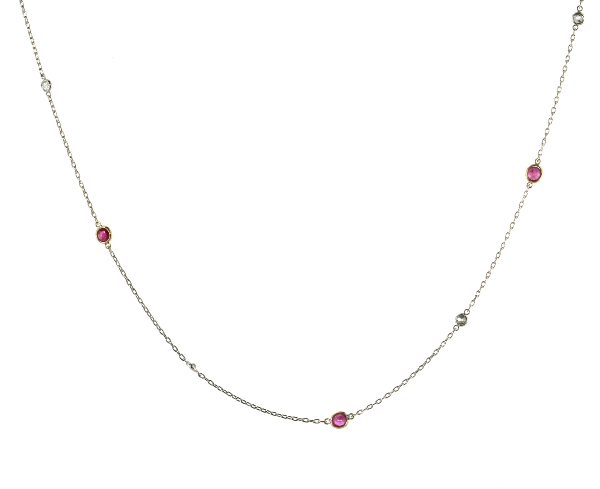 A RUBY AND DIAMOND LONGCHAIN NECKLACE set with alternating round cut rubies and diamonds, length