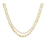 A LONG PEARL NECKLACE comprising a single row of two hundred and eighty eight graduated pearls up to
