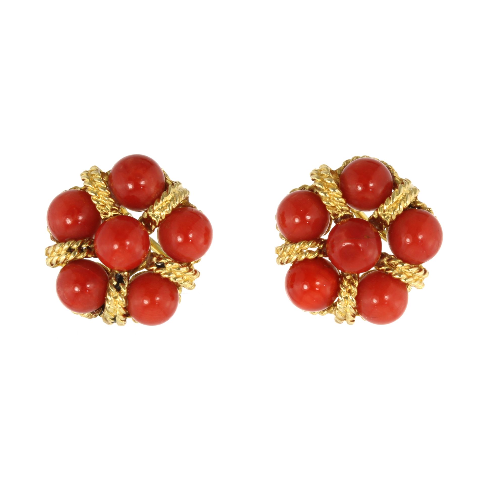 A PAIR OF CORAL EARRINGS, CIRCA 1970 each set with a cluster of six coral beads within twisted