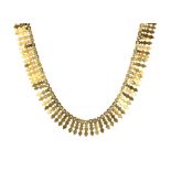 A FANCY LINK NECKLACE comprising a single row of fancy shaped gold links, length 490mm.