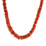 AN ANTIQUE CARVED CORAL BEAD NECKLACE, EARLY 19TH CENTURY designed as a single row of seventy-nine