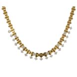 A DIAMOND NECKLACE, CIRCA 1980 designed as a single row of adjoining diamond motifs jewelled with