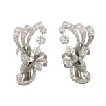 A PAIR OF DIAMOND FLOWER EARRINGS, MID 20TH CENTURY each designed as a floral spray jewelled with