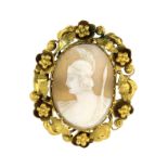 AN ANTIQUE CARVED CAMEO BROOCH set with an oval carved cameo depicting a centurion, within a fine