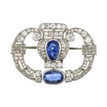 AN ANTIQUE SAPPHIRE AND DIAMOND BROOCH, CIRCA 1930 set with two oval cut blue sapphires of 2.65