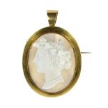 AN ANTIQUE CARVED AGATE CAMEO PENDANT / BROOCH set with a large oval agate cameo carved in high