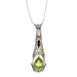 AN ANTIQUE ART DECO PERIDOT, ONYX, PEARL AND DIAMOND NECKLACE set with a large pear cut peridot