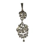 A DIAMOND PENDANT, LATE 19TH CENTURY featuring scrolling motifs jewelled with rows of graduated rose