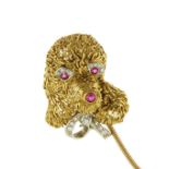 A RUBY AND DIAMOND DOG BROOCH, CIRCA 1980 designed to depict a toy poodle caricature, with ruby