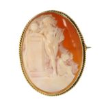 A CARVED CAMEO BROOCH, EARLY 20TH CENTURY set with a central oval carved cameo depicting a lady