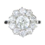 A DIAMOND CLUSTER DRESS RING in platinum set with a central old round cut diamond of 1.60 carats