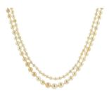 A LONG PEARL NECKLACE in 14ct white gold comprising a single row of two hundred and eighty eight