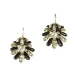 A PAIR OF ANTIQUE DIAMOND AND ENAMEL EARRINGS in high carat yellow gold each designed as a scallop