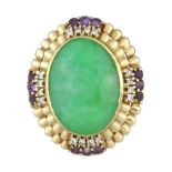 A JADEITE JADE, AMETHYST AND DIAMOND RING in yellow gold set with a large oval jade cabochon of 20.