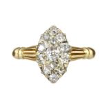 AN ANTIQUE DIAMOND CLUSTER RING in 18ct yellow gold the marquise motif set with a central old mine